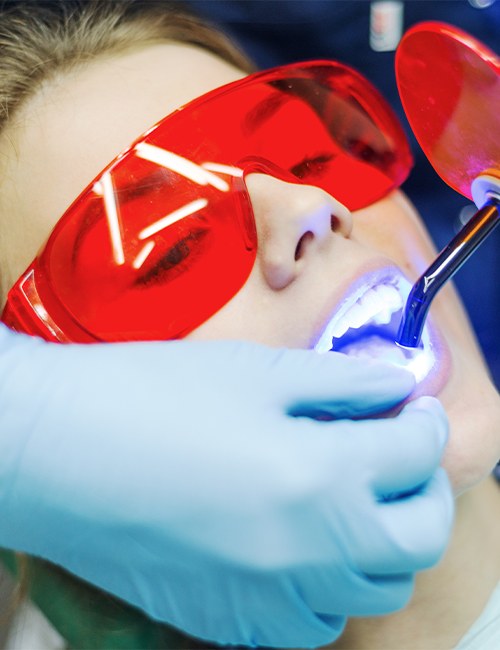 Patient receiving cosmetic dental bonding