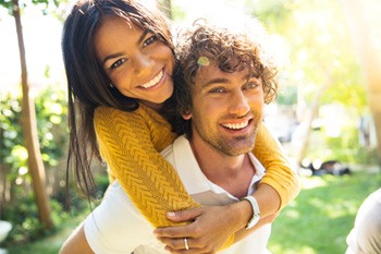 a couple smiling with bright teeth in Copperas Cove