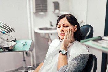 Dental patient with toothache, waiting for care