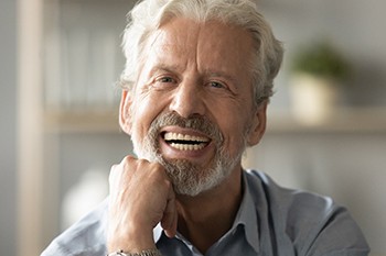 Man smiling with dentures