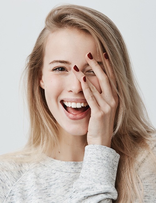 woman smiling with tooth-colored fillings in Copperas Cove