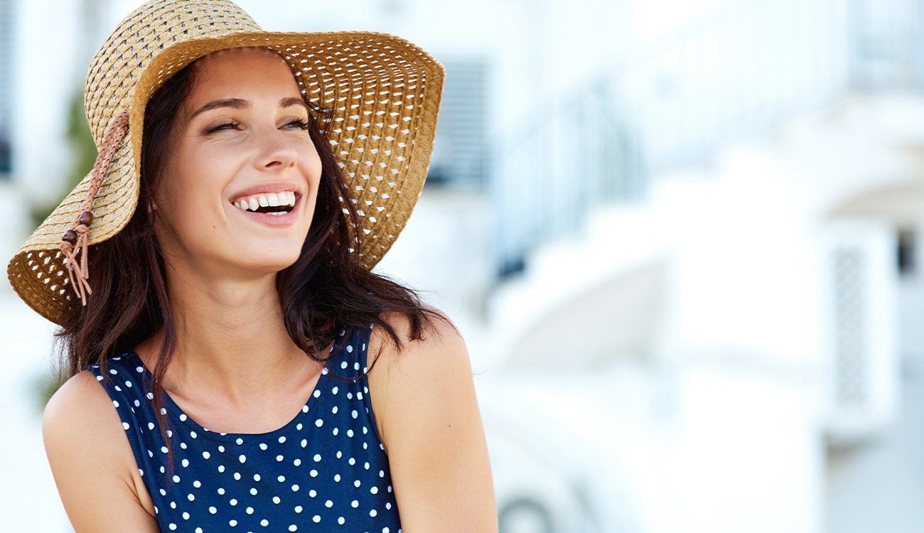 Woman with gorgeous smile after cosmetic dentistry