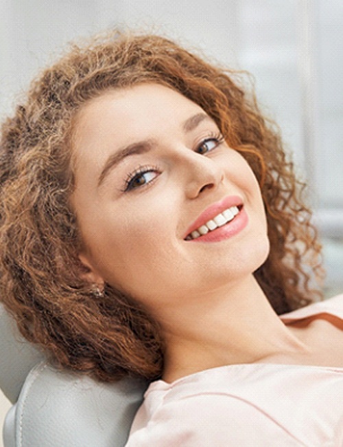 Woman smiling while visiting sedation dentist in Copperas Cove