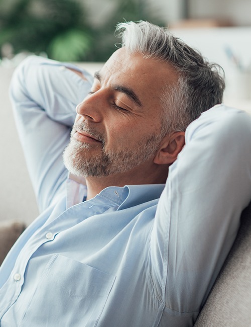 Man relaxing after sedation dentistry visit