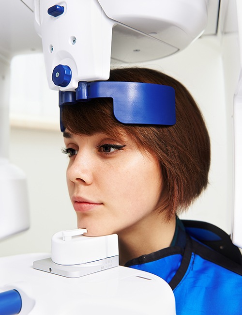 Woman receiving digital x-ray scans