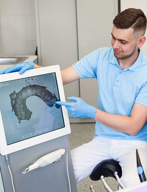 Dental team member using cavit detection system