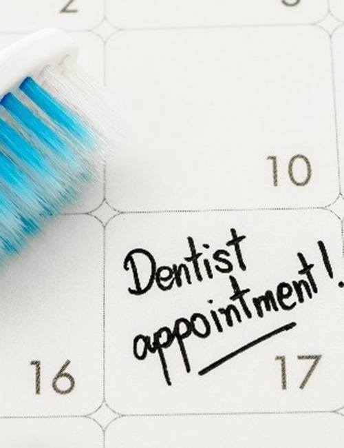 Dentist appointment and toothbrush on calendar 