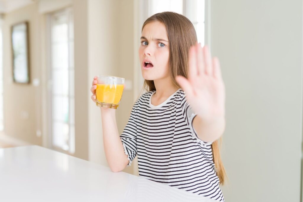 A child refusing juice